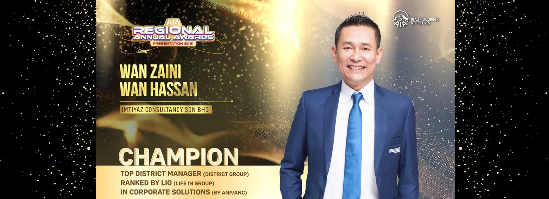 AIA Regional Annual Awards Presentation 2021 slide: Wan Zaini Wan Hassan, Imtiyaz Consultancy Sdn Bhd — Champion, Top District Manager (District Group) ranked by LIG (Life In Group) in Corporate Solutions (by ANP/ANC).